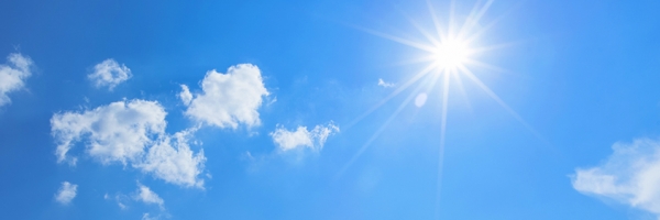 photo of blue sky with some clouds and sun