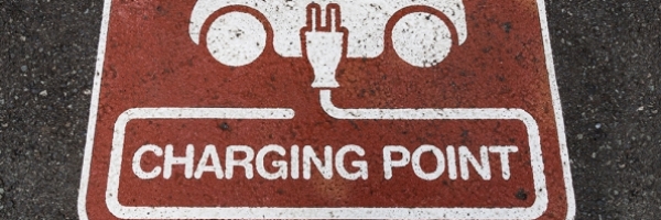 electric vehicle quick charge sign on parking spot